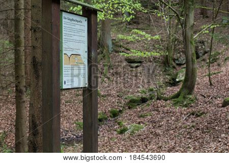 a source or fontain for water in the forest next to schwandorf in bavaria strem Goegglbach G