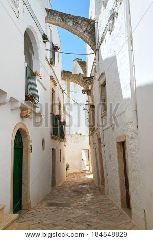 Characteristic alleyway of Locorotondo. Puglia. Southern Italy.