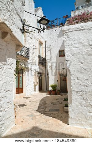 Characteristic alleyway of Locorotondo. Puglia. Southern Italy.