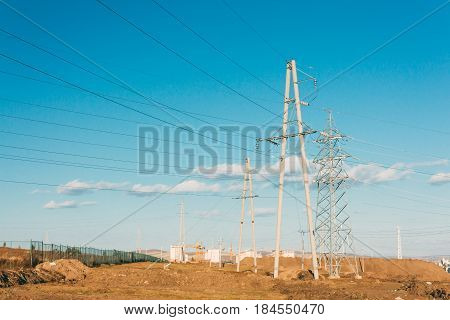 Electric Power Transmission Pylon On Inner Mongolia Grassland Against Blue Sky  ,china