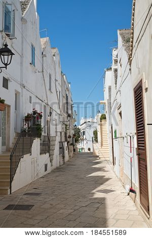 Characteristic alleyway of Locorotondo. Puglia. Southern Italy.