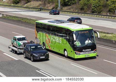 Fraknfurt Germany - March 30 2017: Flixbus coach on the autobahn. Flixbus is an european long distance coach service