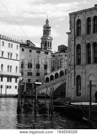 Canal in venice showing the rialto bridge