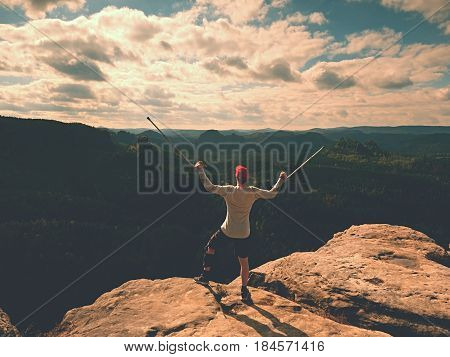 Happy Man With Broken Leg In Immobilizer And Medicine Pole Stay Finnaly On  Peak.