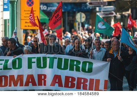 PORTO, PORTUGAL - MAY 1, 2017: During celebration of May Day in the city centre. General Confederation of Portuguese workers, traditionally associated with the Communist party, has 800.000 members.