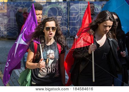 PORTO, PORTUGAL - MAY 1, 2017: During celebration of May Day in the city centre. General Confederation of Portuguese workers, traditionally associated with the Communist party, has 800.000 members.