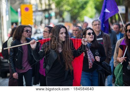 PORTO, PORTUGAL - MAY 1, 2017: During celebration of May Day in the city centre. General Confederation of Portuguese workers, traditionally associated with the Communist party, has 800.000 members.