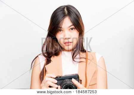 Portrait Of Asian Young Woman Taking Pictures On The White Background