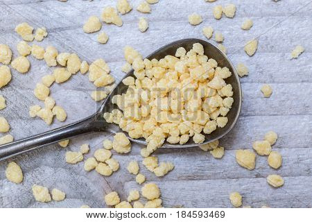 Emiliane on a spoon macro picture background