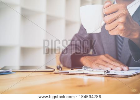 Looking for direction and inspiration, Business working at an office, Office desk table with computer, supplies, flower. Top view. Copy space for text