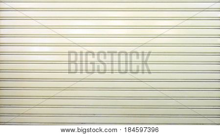 white zinc wall texture or old metal texture background. Steel door horizontal with pattern for design.