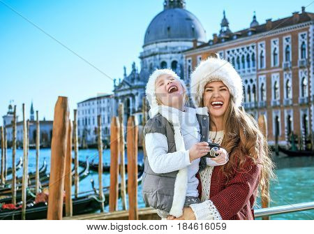 Mother And Child Travellers In Venice With Digital Photo Camera