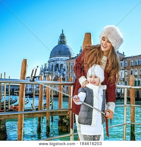 Mother And Child In Venice Taking Selfie Using Selfie Stick
