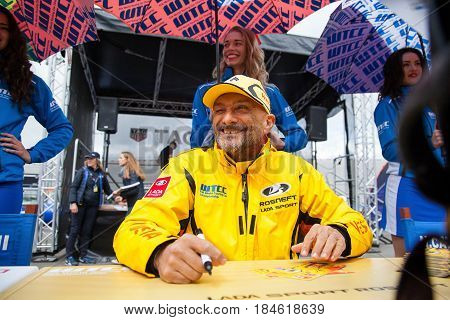 Moscow, Russia - 12 June 2016: world championship WTCC at the Moscow Raceway. Gabriele Tarquini team Lada Sport Rosneft greets fans