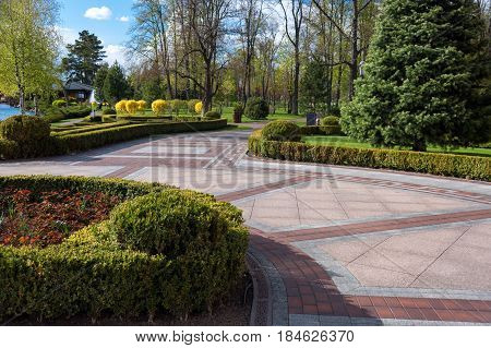 Garden with topiary landscape. Landscaping in the park.