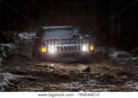 Leningrad region, Russia - April 30, 2017. Hammer H3 off-road in the Leningrad region. Hummer H3 is a compact SUV produced by GM