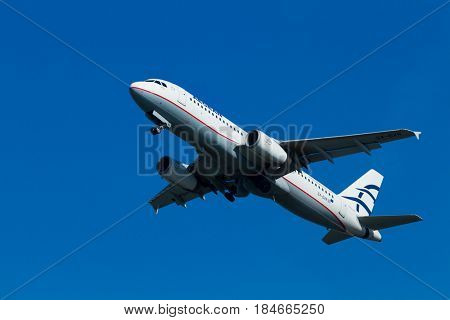 CORFU, GREECE - April 25: An Aegean Airbus charter taking off  in Corfu,Aegean is an airline from Greece with its headquarters in Athens