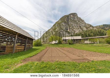 Traditional wooden double hayrack in small village of Studor near Bohinj in Slovenia during spring time