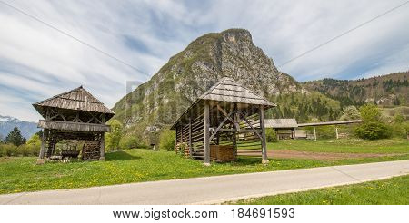 Traditional wooden double hayrack in small village of Studor near Bohinj in Slovenia during spring time