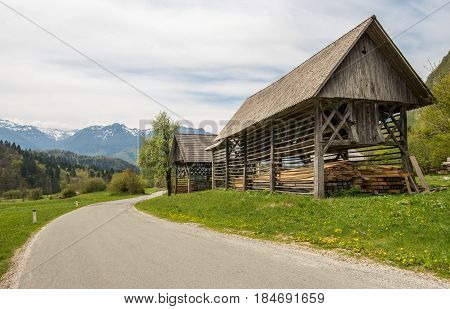 Traditional wooden double hayrack in small village of Studor near Bohinj in Slovenia during spring time