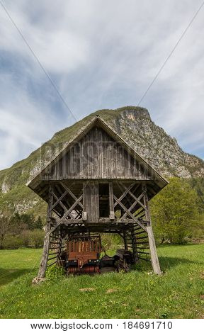 Traditional wooden double hayrack in small village of Studor near Bohinj in Slovenia during spring time