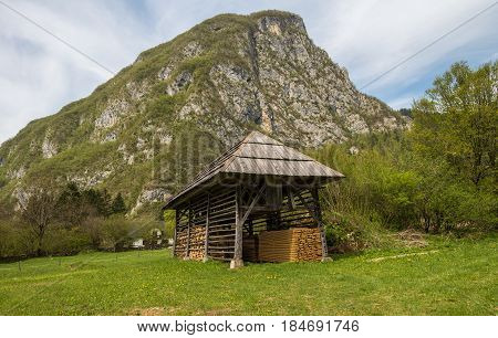 Traditional wooden double hayrack in small village of Studor near Bohinj in Slovenia during spring time
