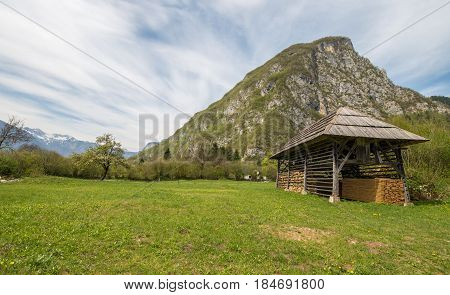 Traditional wooden double hayrack in small village of Studor near Bohinj in Slovenia during spring time