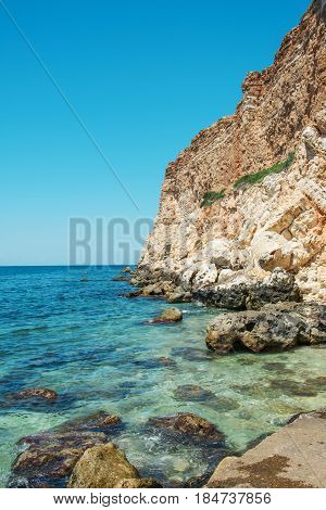 Amazing view on black sea near rocks in hot summer. Vacation summer travel. Black sea Sevastopol Crimea.