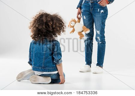 Mother With Toy Standing With Daughter