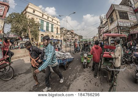 Delhi, India - January 27, 2017: Ordinary Crowdy City Life At Chandni Chowk, Old Delhi, Famous Trave