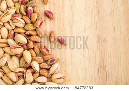 Heap Of Inshell Pistachios And Peeled Pistachios