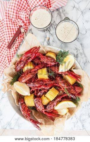 Boiled crawfish with dill and fresh lemon