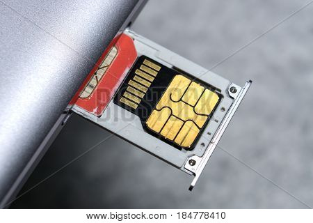 dual slot sim card tray in smartphone.