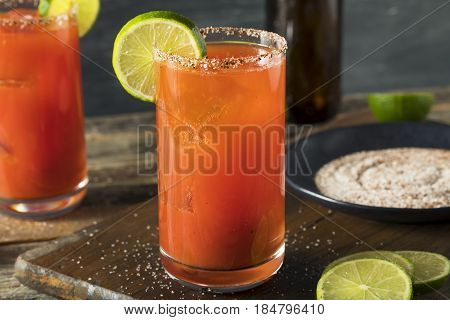 Homemade Michelada With Beer And Tomato Juice