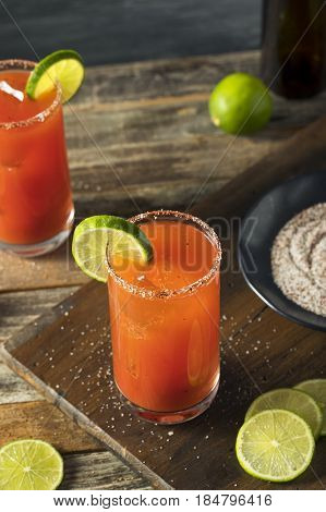 Homemade Michelada With Beer And Tomato Juice
