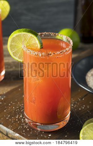 Homemade Michelada With Beer And Tomato Juice