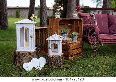 Beautiful Wedding Ceremony Outdoors. Decorated Chairs Stand On The Grass. Wedding Arch Made  Flowers