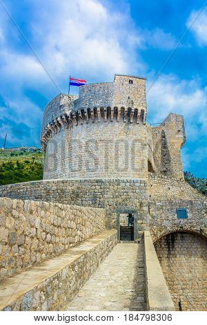 Scenic vertical view at old famous tower Minceta in old own Dubrovnik, popular viewpoint and sightseeing spot in Europe, Croatia.