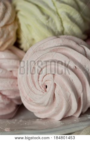 Close up of Homemade sweet pink zephyr. Sweet marshmallow or zephyr