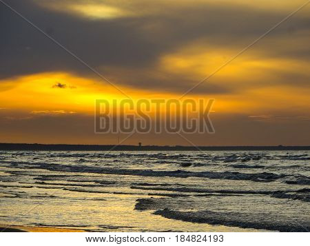 Sunset on the shore of the Gulf of Riga in Jurmala.