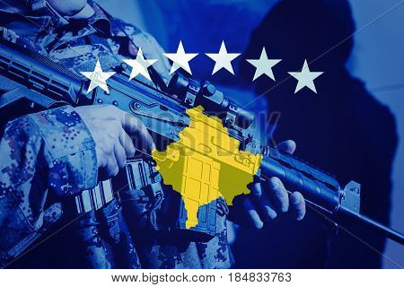 Soldier With Machine Gun With National Flag Of Kosovo