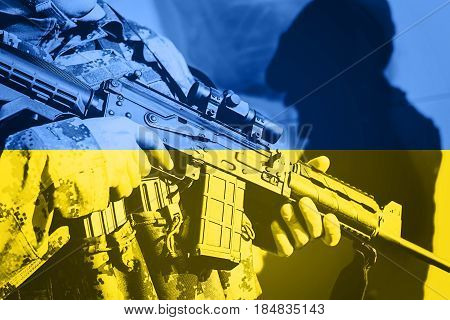 Soldier With Machine Gun With National Flag Of Ukraine
