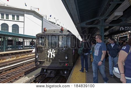 BRONX NEW YORK USA - APRIL 10: A vintage Low Voltage train from the early 1900's stops at Yankee Stadium for opening day game. Taken April 10 2017 in New York.