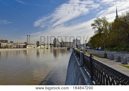 MOSCOW/ RUSSIA - MAY 1, 2017. Krasnopresnenskaya embankment and Moskva-river as seen from the embankment of Taras Shevchenko. Moscow, Russia. Moscow, Russia