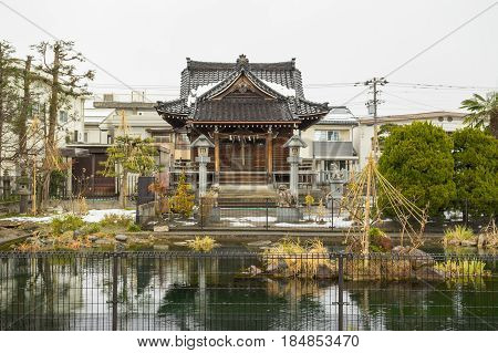 TOYAMA JAPAN - FEB 7, 2017: Traditional wood small Japan shrine view in Toyama city, Japan