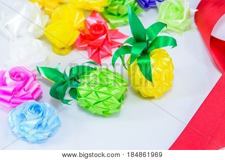 Set ribbon folded into a flower. Wrap coins by hand. for the sacred(ordination matriculation initiation) in Thailand on white background
