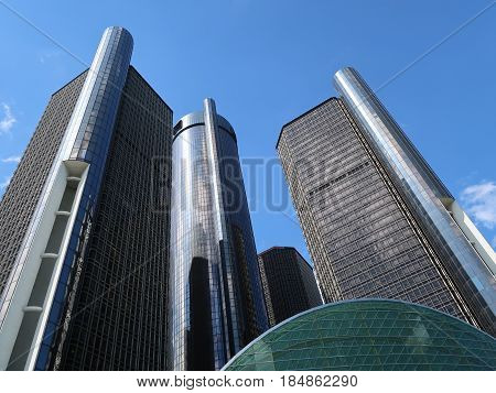 DETROIT - May 1, 2017. The sunlit towers of the Renaissance Center, located on the Detroit River in downtown Detroit, are seen rising into a blue sky. Built in 1977, the RenCen, as it is often called, is the tallest building in Michigan.