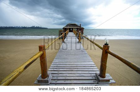 Wooden pier in Catembe towards Maputo bay