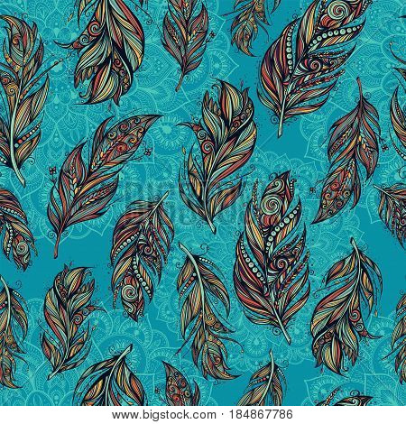 seamless pattern with feathers on mandala background