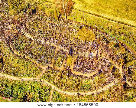 Siauliai region, Lithuania: aerial above view of Hill of Crosses, Kryziu Kalnas. It is a famous religious site of catholic pilgrimage in Lithuania. Beautiful touristic destination in Baltic states.